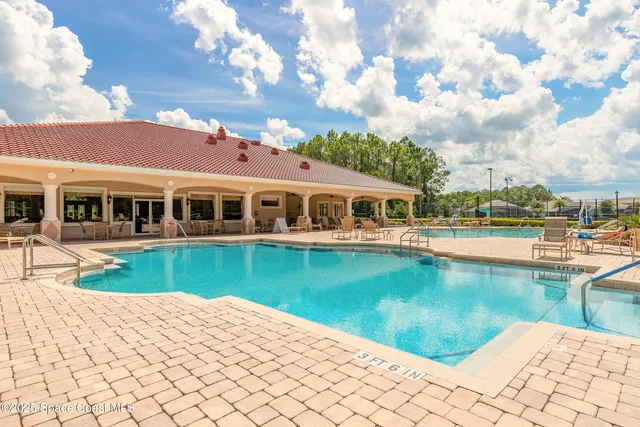 a view of a house with a swimming pool
