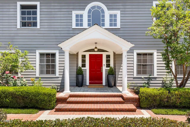 a front view of a house with a porch