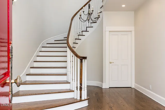 a view of entryway with wooden floor