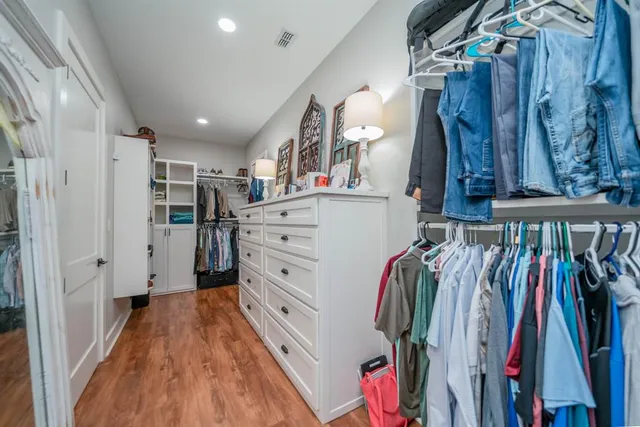 a kitchen with a sink cabinets and window
