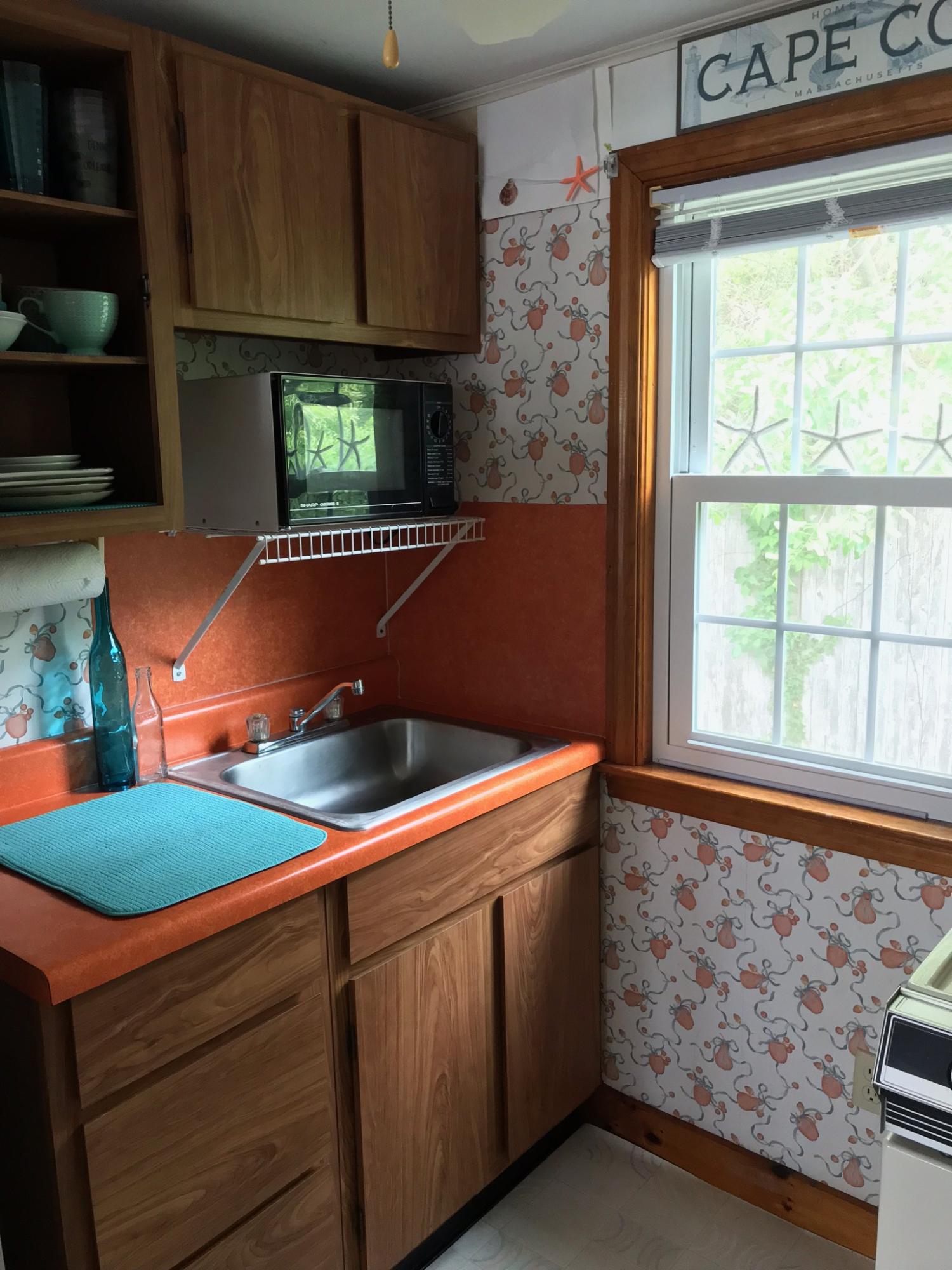49 Lower County Road, Unit U 7 Dennis Port, MA 02639 - Photo 8 of 23 a room with storage and utility
