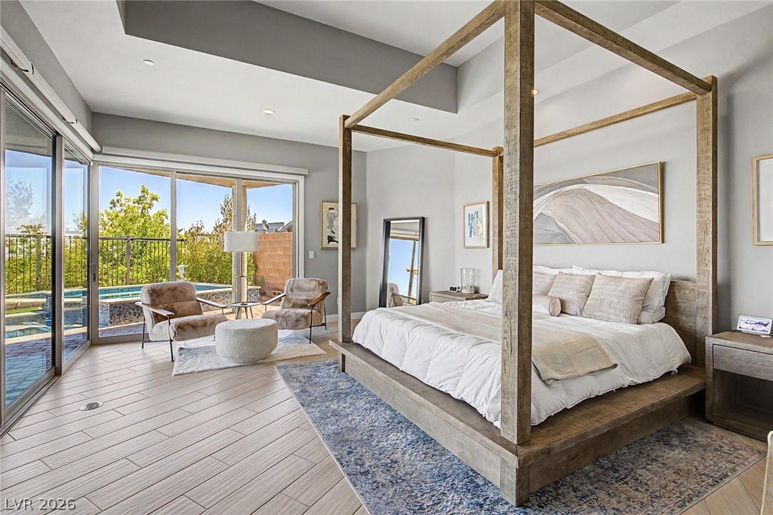 6014 Willow Ridge Court Las Vegas, NV 89135 - Photo 38 of 99 This primary bedroom offers direct outdoor access to a private pool and spa.