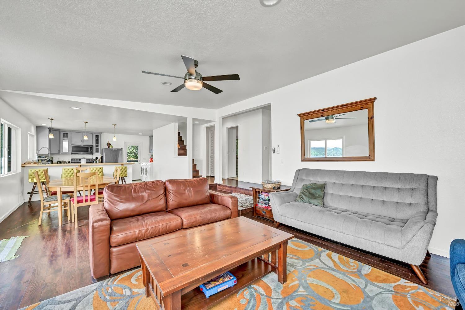 13624 Anderson Road Lower Lake, CA 95457 - Photo 11 of 31 a living room with furniture and a wooden floor