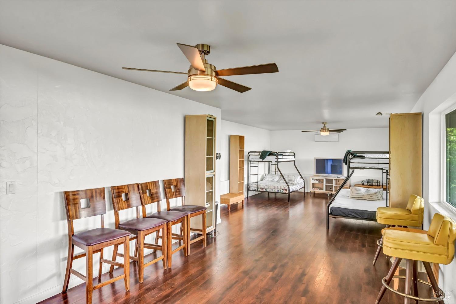 13624 Anderson Road Lower Lake, CA 95457 - Photo 20 of 31 a living room with furniture and wooden floor