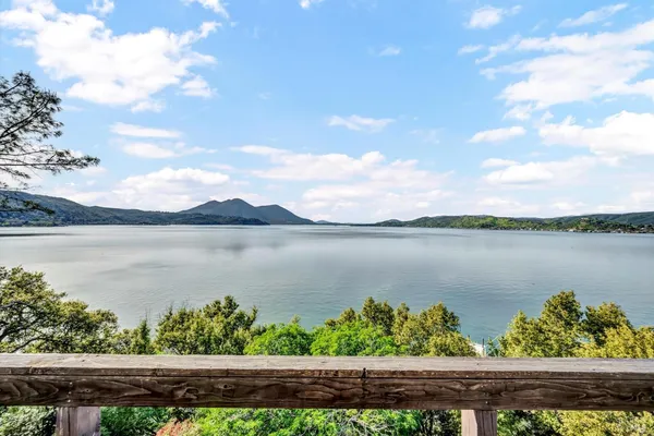 a view of a lake from a balcony