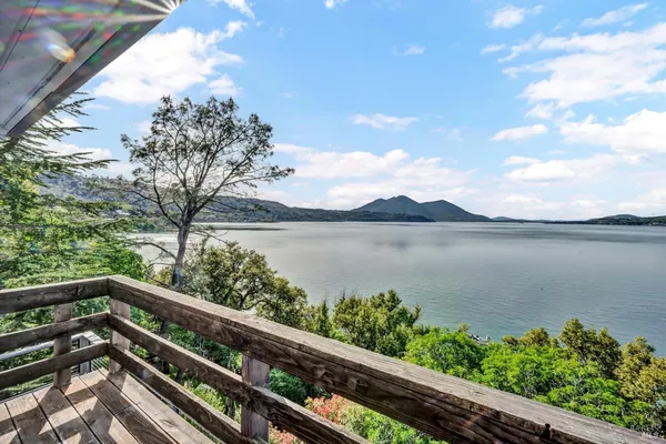 a view of lake from a balcony