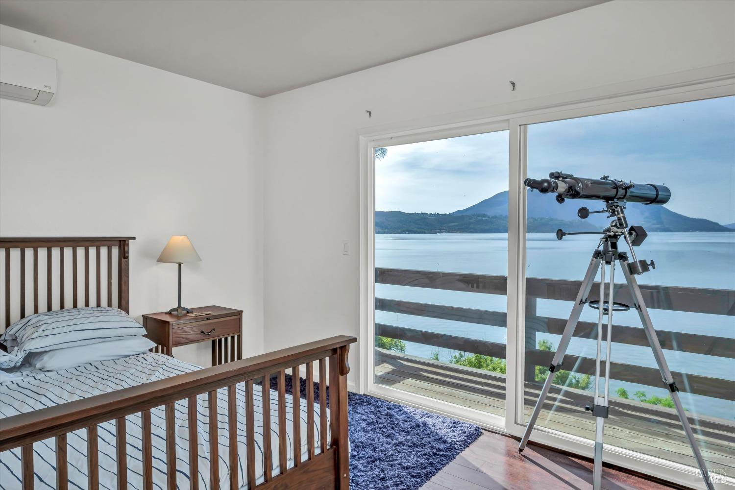 13624 Anderson Road Lower Lake, CA 95457 - Photo 6 of 31 a bedroom with a bed and a window