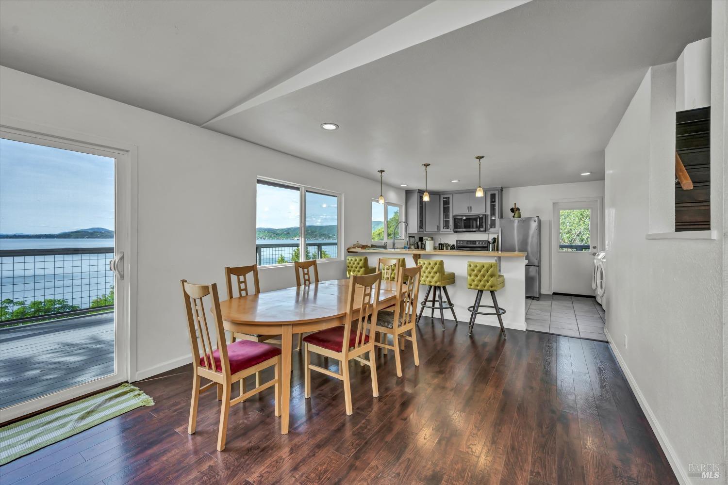 13624 Anderson Road Lower Lake, CA 95457 - Photo 7 of 31 a view of a dining room with furniture and wooden floor