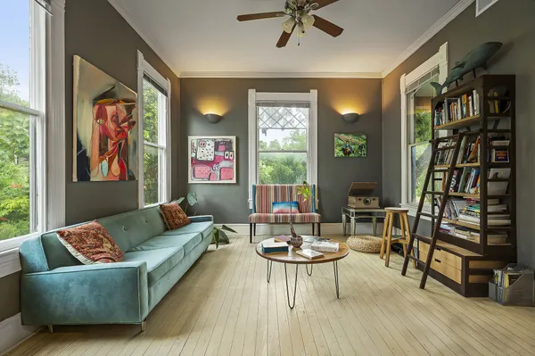 a living room with furniture and a window