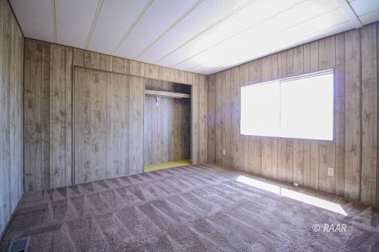 1313 North Leroy Street Ridgecrest, CA 93555 - Photo 21 of 27 a view of an empty room with a window