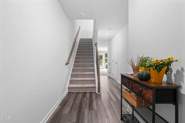 a view of entryway with wooden floor