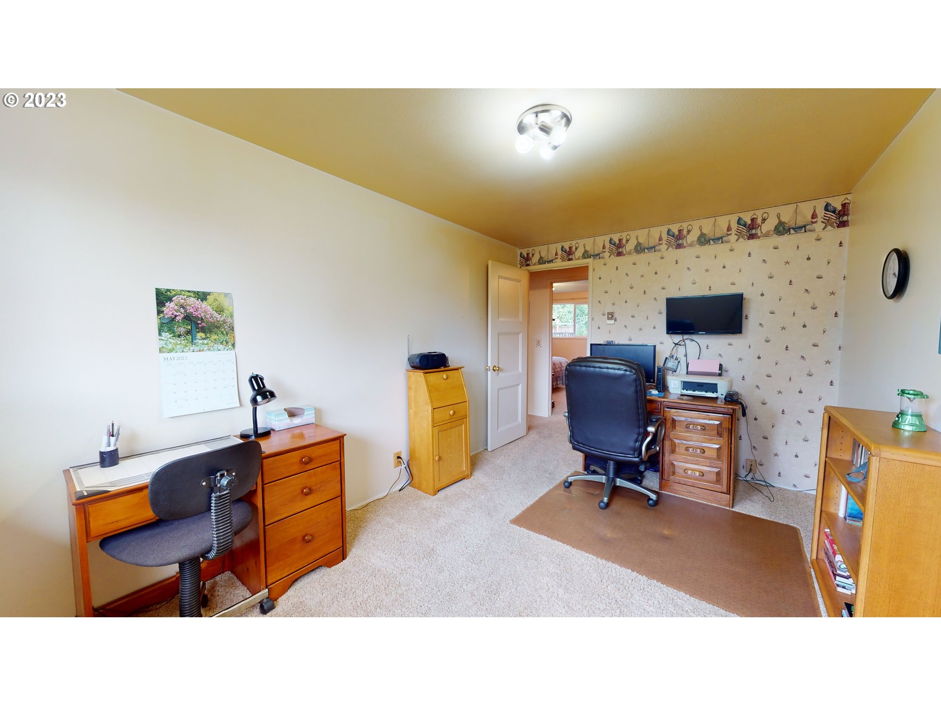 1621 Rambling Drive Springfield, OR 97477 - Photo 21 of 33 a living room with a couch and piano