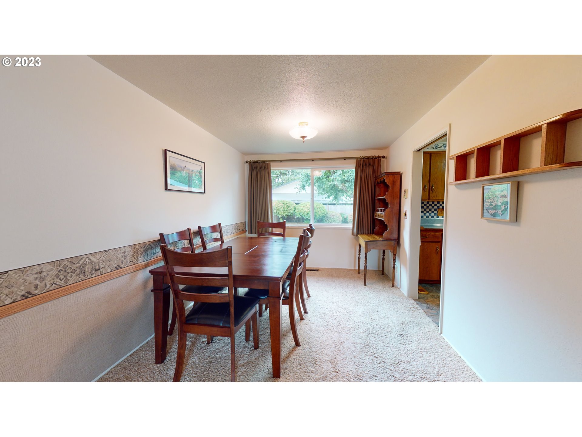 1621 Rambling Drive Springfield, OR 97477 - Photo 7 of 33 a open kitchen with dining room and wooden floor