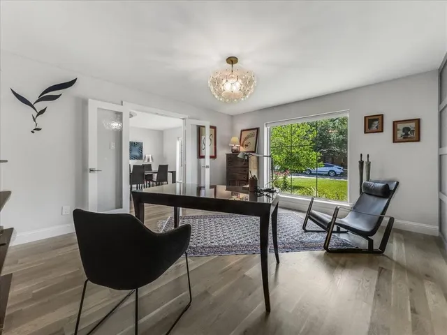 a living room with furniture and a rug