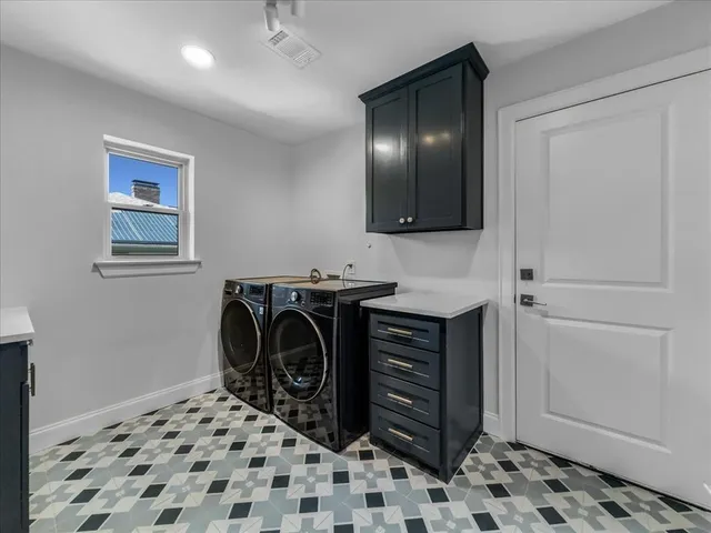 a view of a living room and dining room