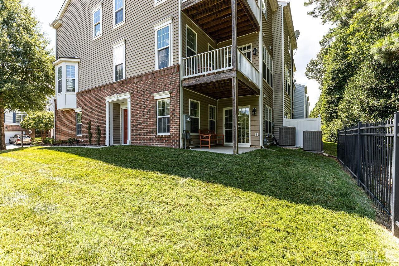 3512 Edgemont Drive Raleigh, NC 27612 - Photo 30 of 30 a view of a house with backyard and porch