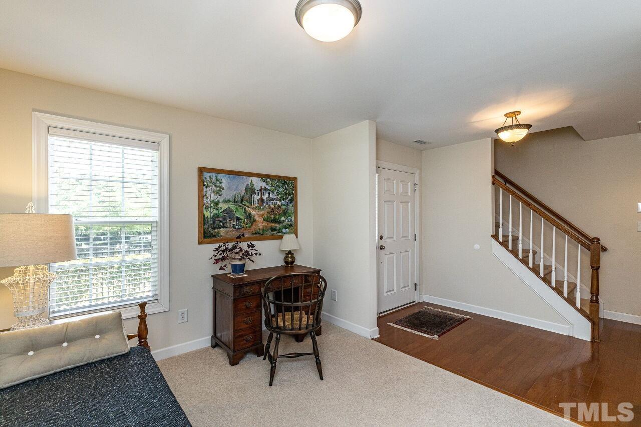 3512 Edgemont Drive Raleigh, NC 27612 - Photo 7 of 30 a view of a livingroom with furniture and a window