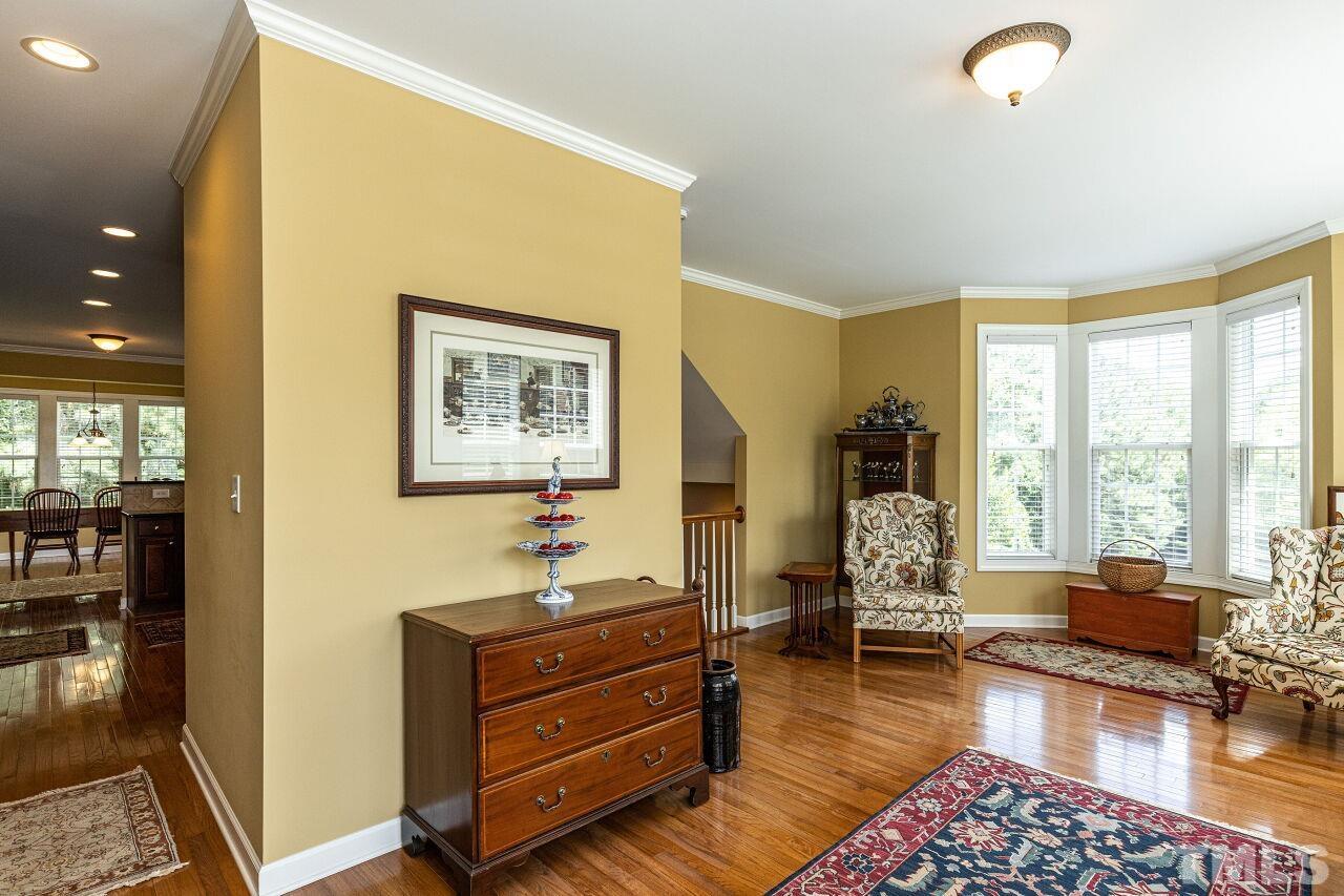 3512 Edgemont Drive Raleigh, NC 27612 - Photo 10 of 30 a living room with furniture and a large window