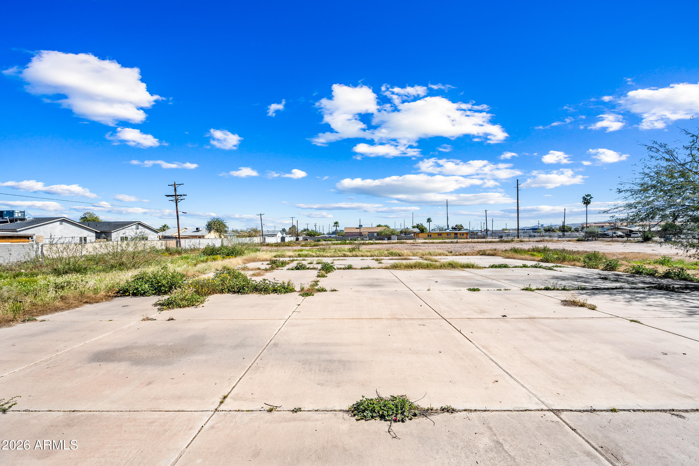 756 West Broadway Road, Unit 3 Phoenix, AZ 85041 - Photo 6 of 12 a view of a swimming pool and an outdoor space