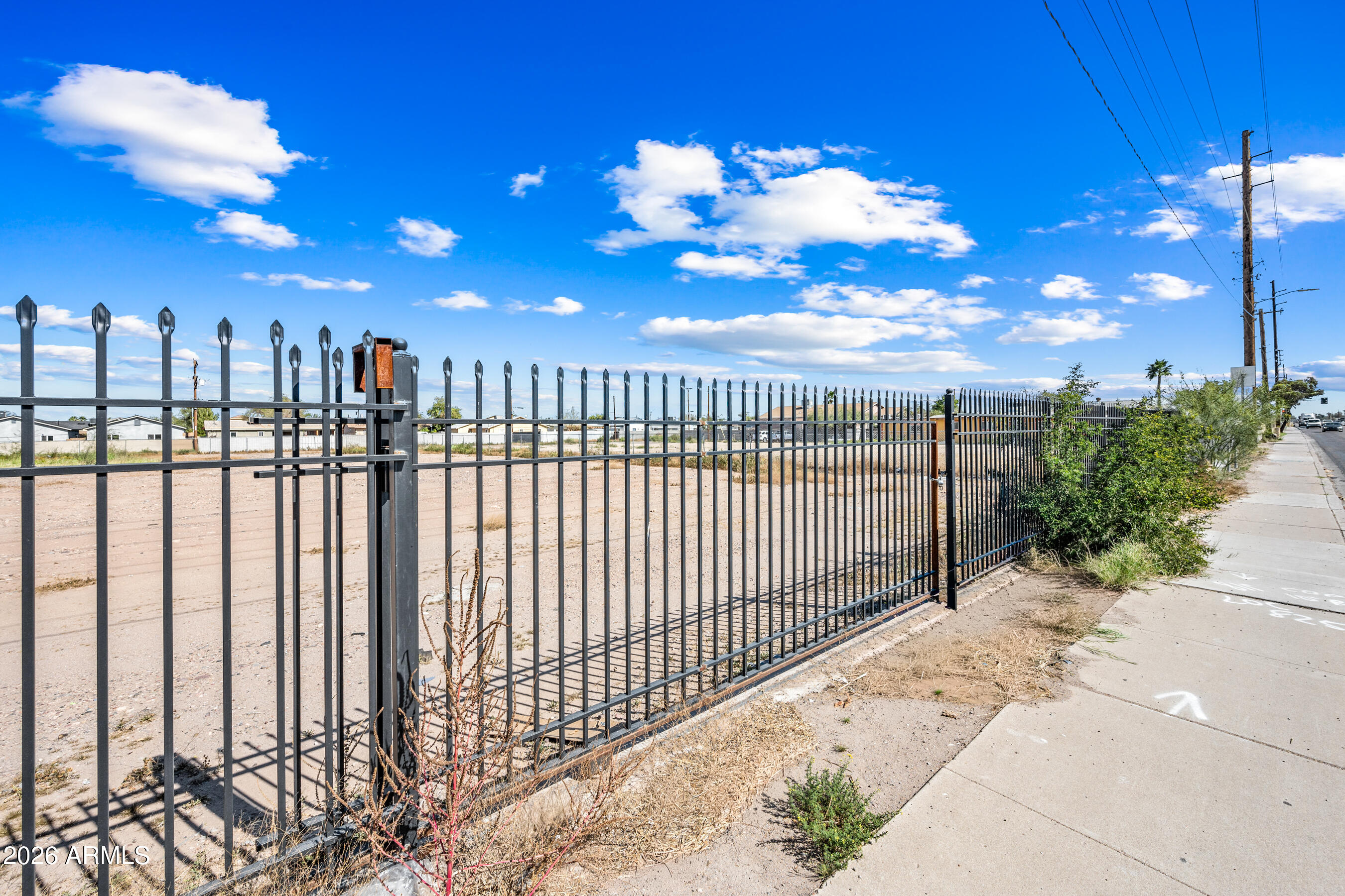756 West Broadway Road, Unit 3 Phoenix, AZ 85041 - Photo 8 of 12 a view of a flower garden