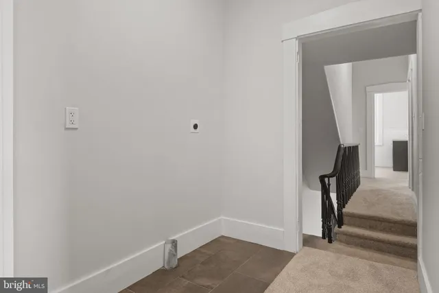 a view of hallway with stairs