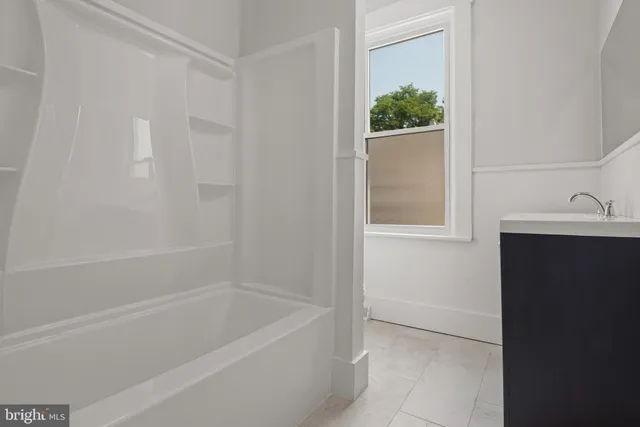 a bathroom with a bathtub