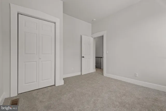 an empty room with an entryway