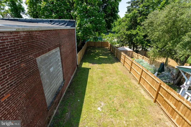 a front view of a building with garden