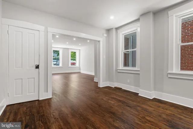 a view of livingroom with hardwood floor and hallway