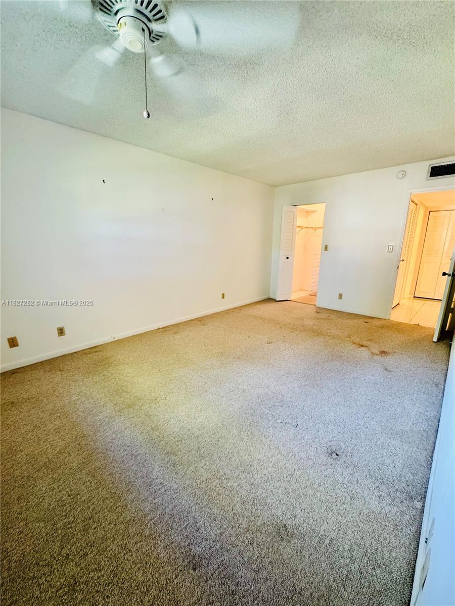 5641 Southwest 2nd Court, Unit 210 Margate, FL 33068 - Photo 20 of 36 a view of an empty room