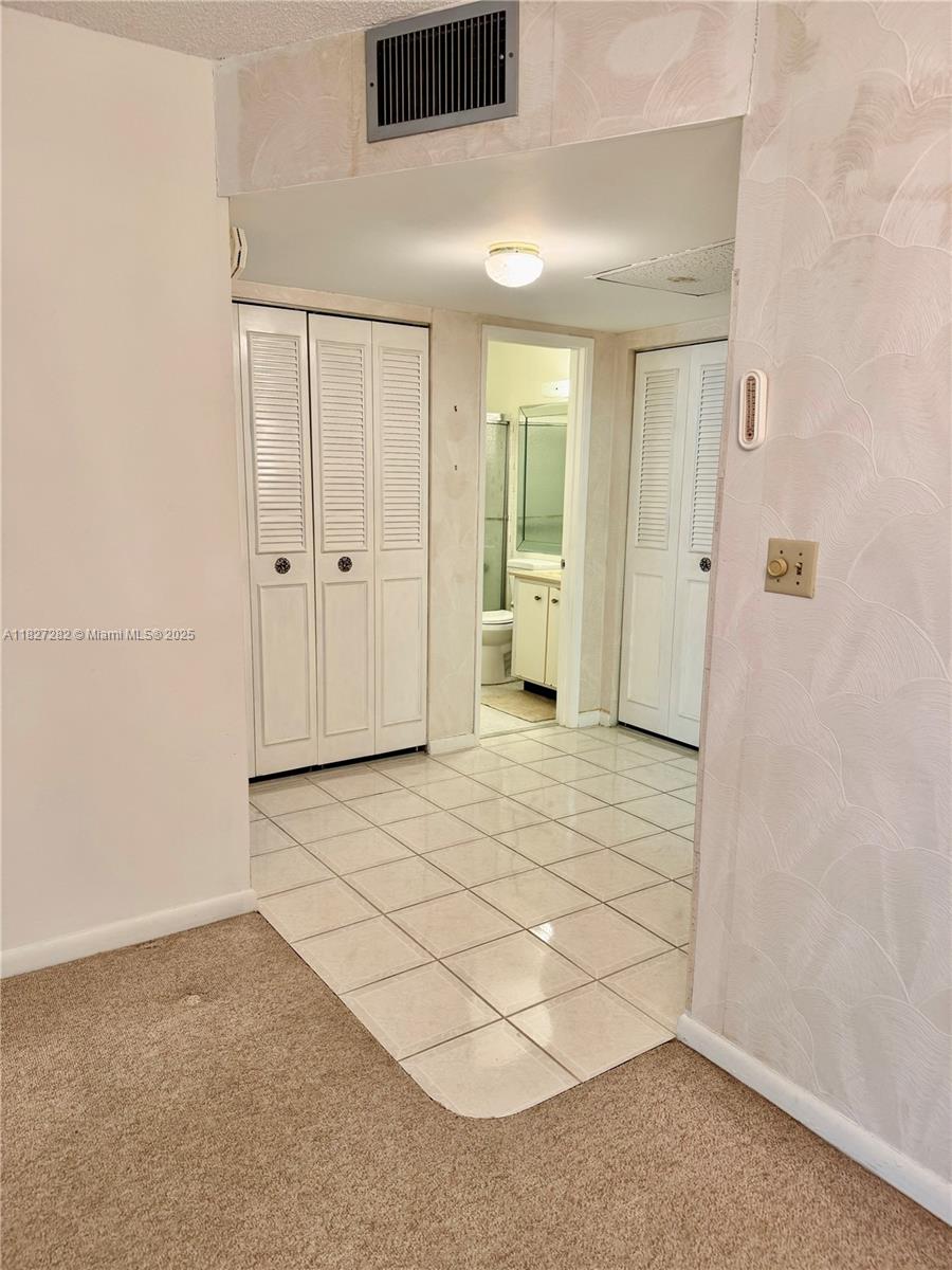 5641 Southwest 2nd Court, Unit 210 Margate, FL 33068 - Photo 29 of 36 a view of a livingroom with wooden floor