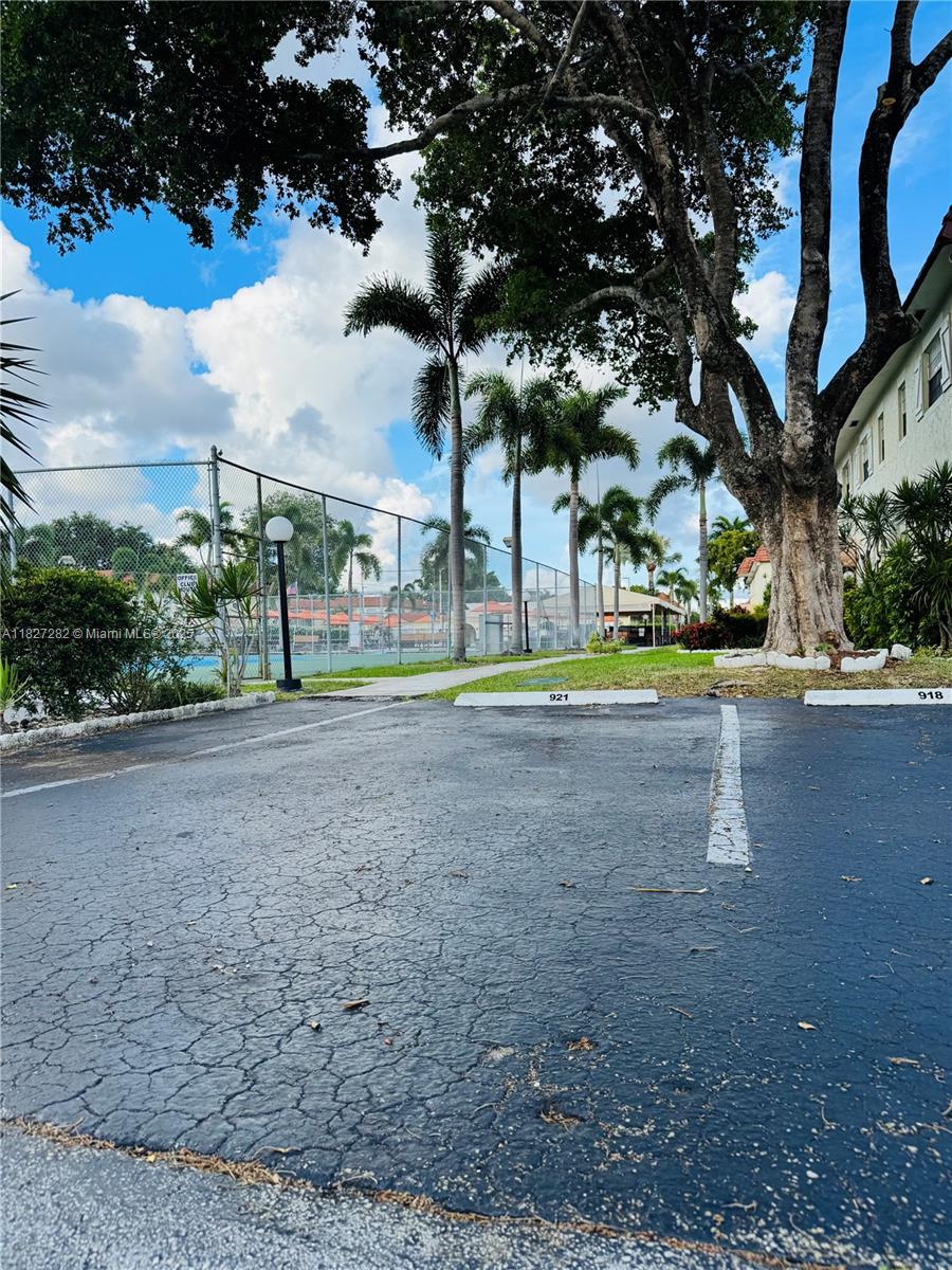 5641 Southwest 2nd Court, Unit 210 Margate, FL 33068 - Photo 36 of 36 a view of a park with large trees