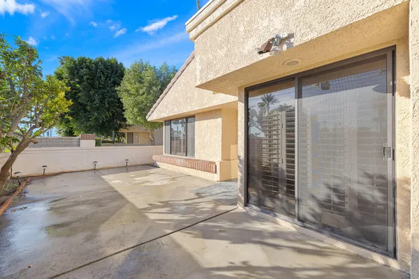 aerial view of a house with a garden