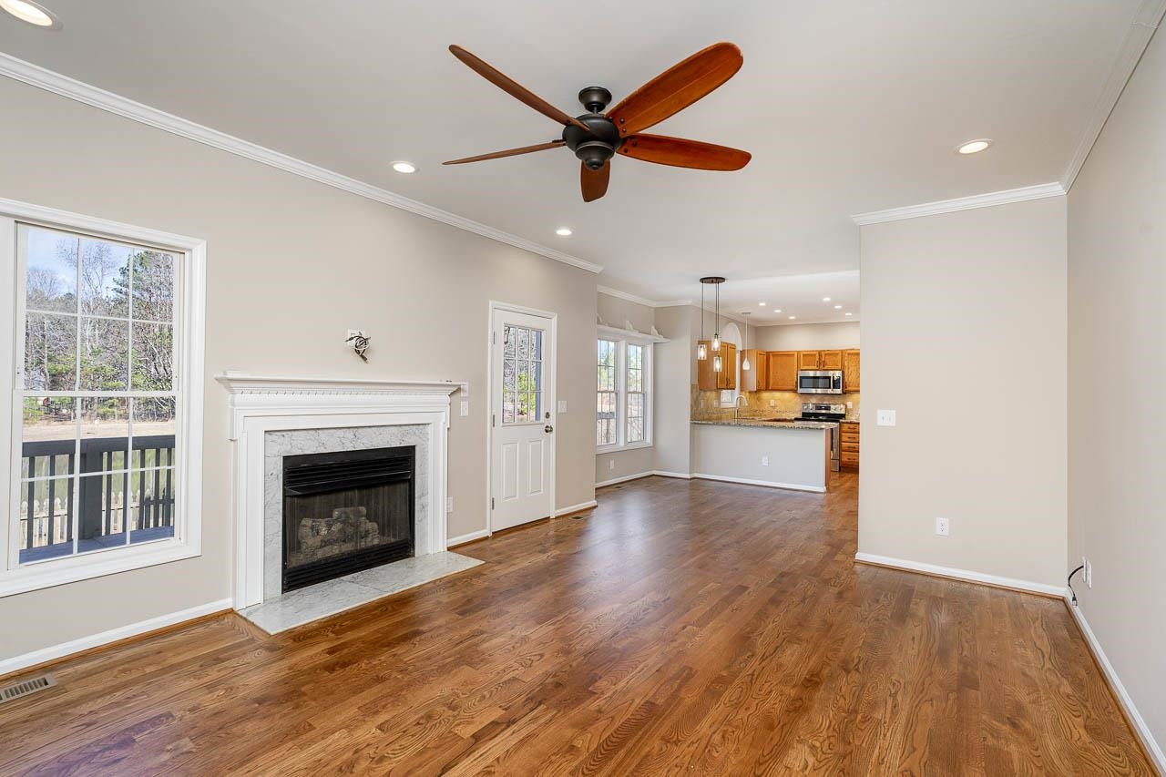 8409 Neuse Timbers Court Raleigh, NC 27616 - Photo 12 of 30 Sunny family room with waterviews from every window Family Room