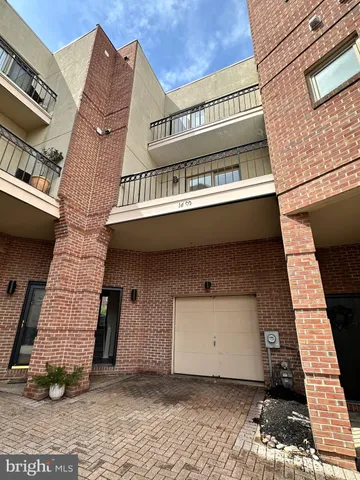 a view of a street with cars