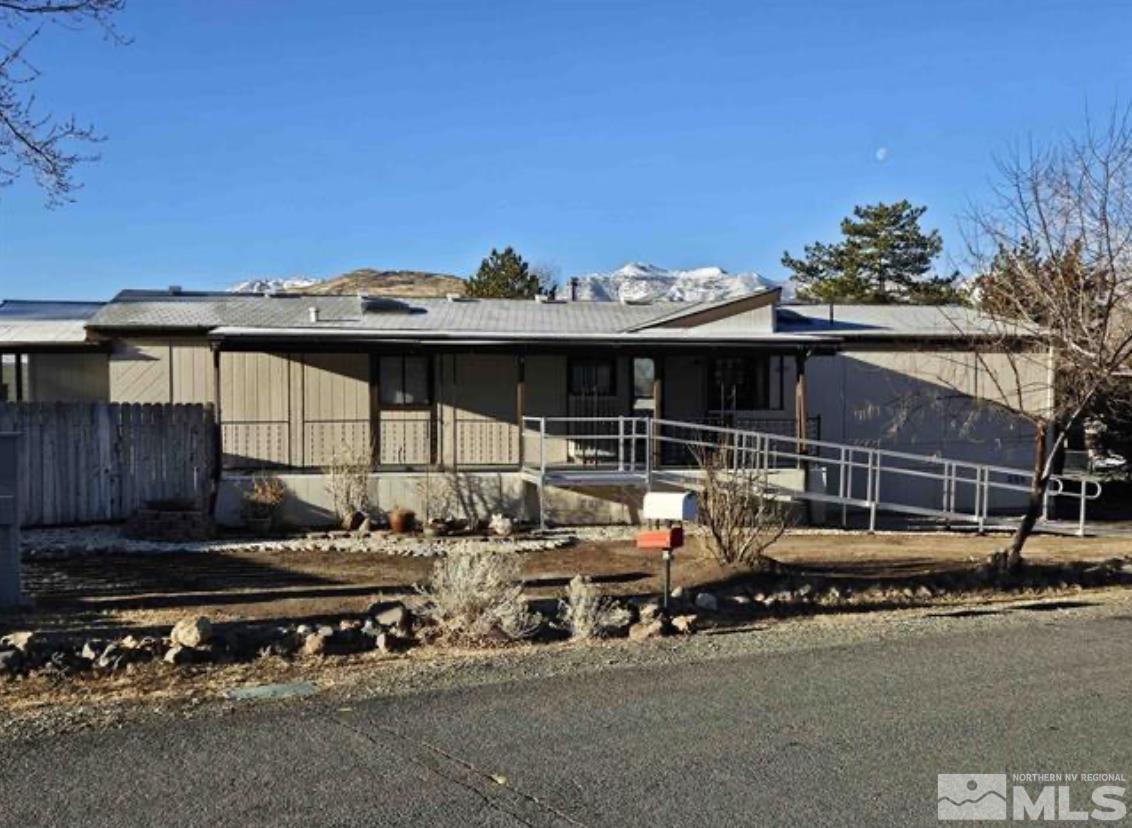16355 Rhyolite Circle Reno, NV 89521 - Photo 2 of 26 a view of a car park in front of house