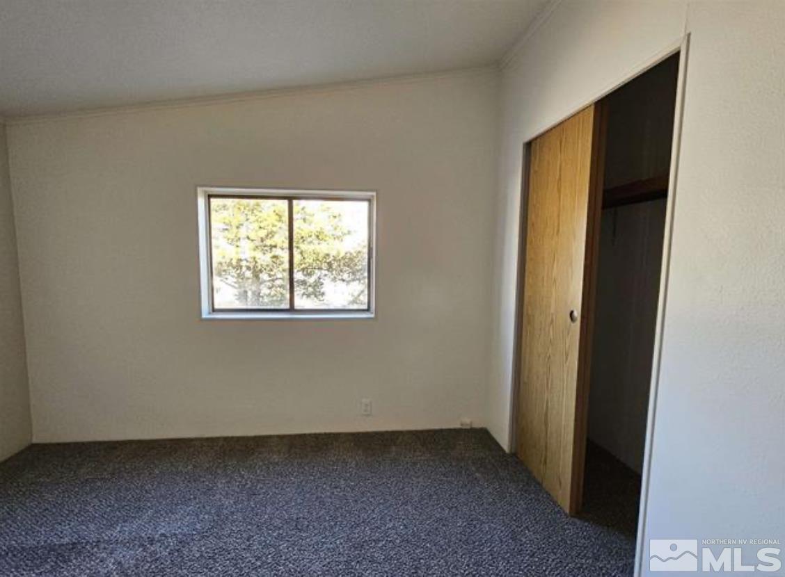 16355 Rhyolite Circle Reno, NV 89521 - Photo 24 of 26 an empty room with windows