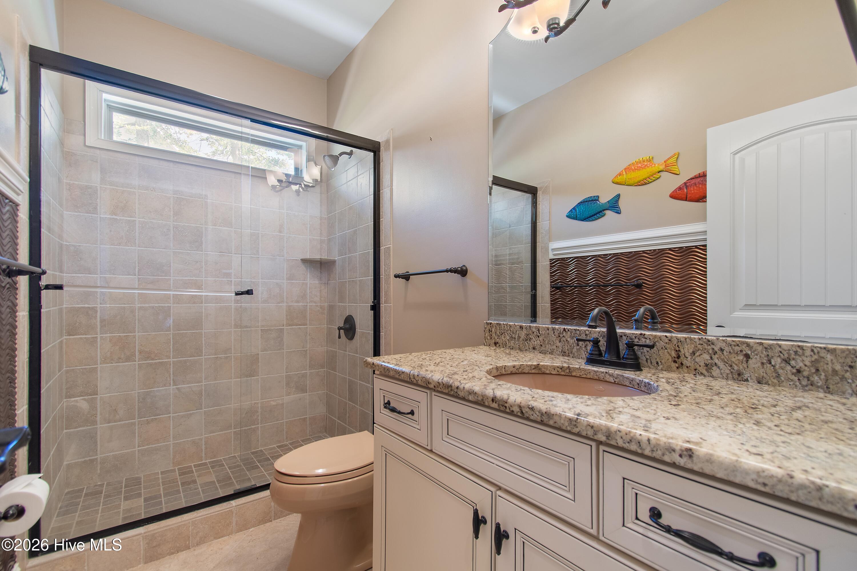 1614 Colonist Square Southwest Ocean Isle Beach, NC 28469 - Photo 37 of 63 Guest bathroom