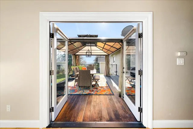 a living room with furniture and a table