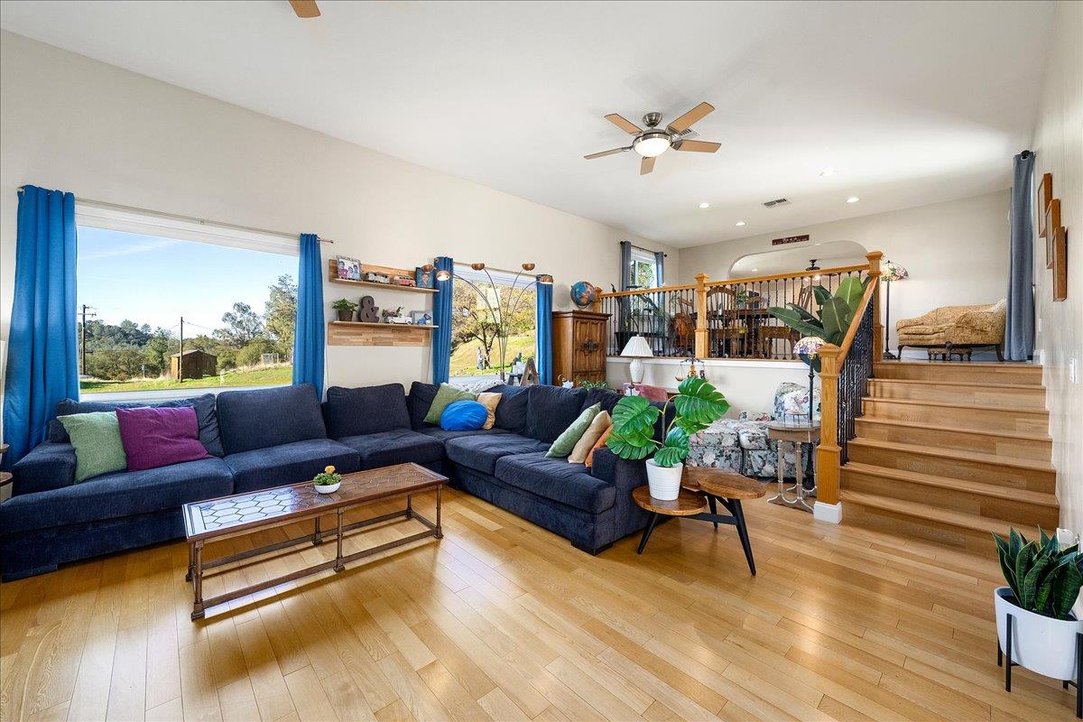 4371 Luneman Road Placerville, CA 95667 - Photo 20 of 77 a living room with furniture and a large window
