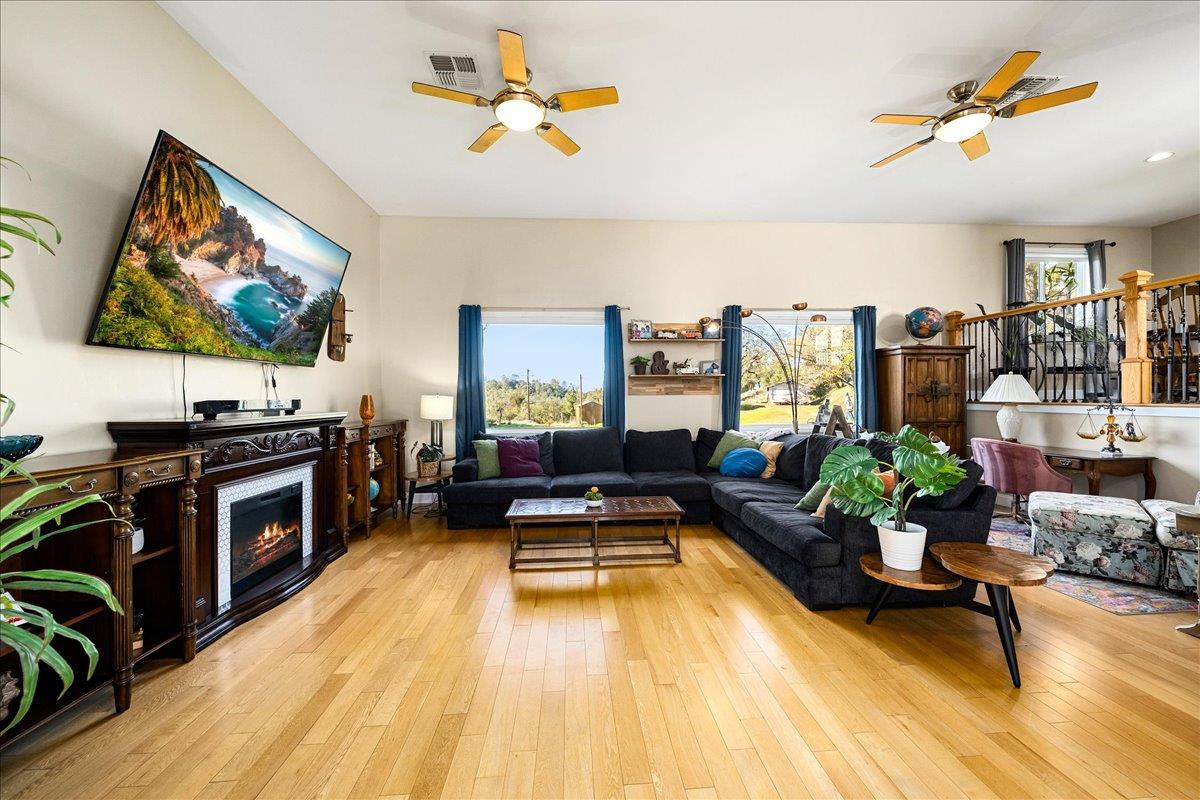4371 Luneman Road Placerville, CA 95667 - Photo 22 of 77 a living room with furniture and a flat screen tv