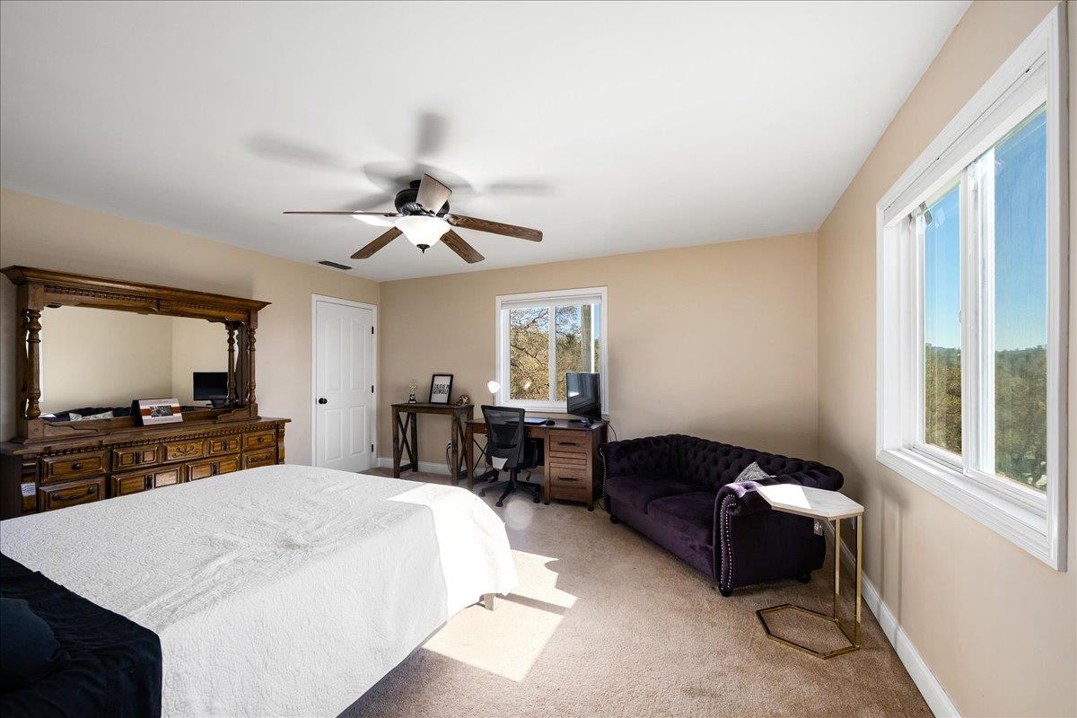 4371 Luneman Road Placerville, CA 95667 - Photo 35 of 77 a living room with furniture and a flat screen tv