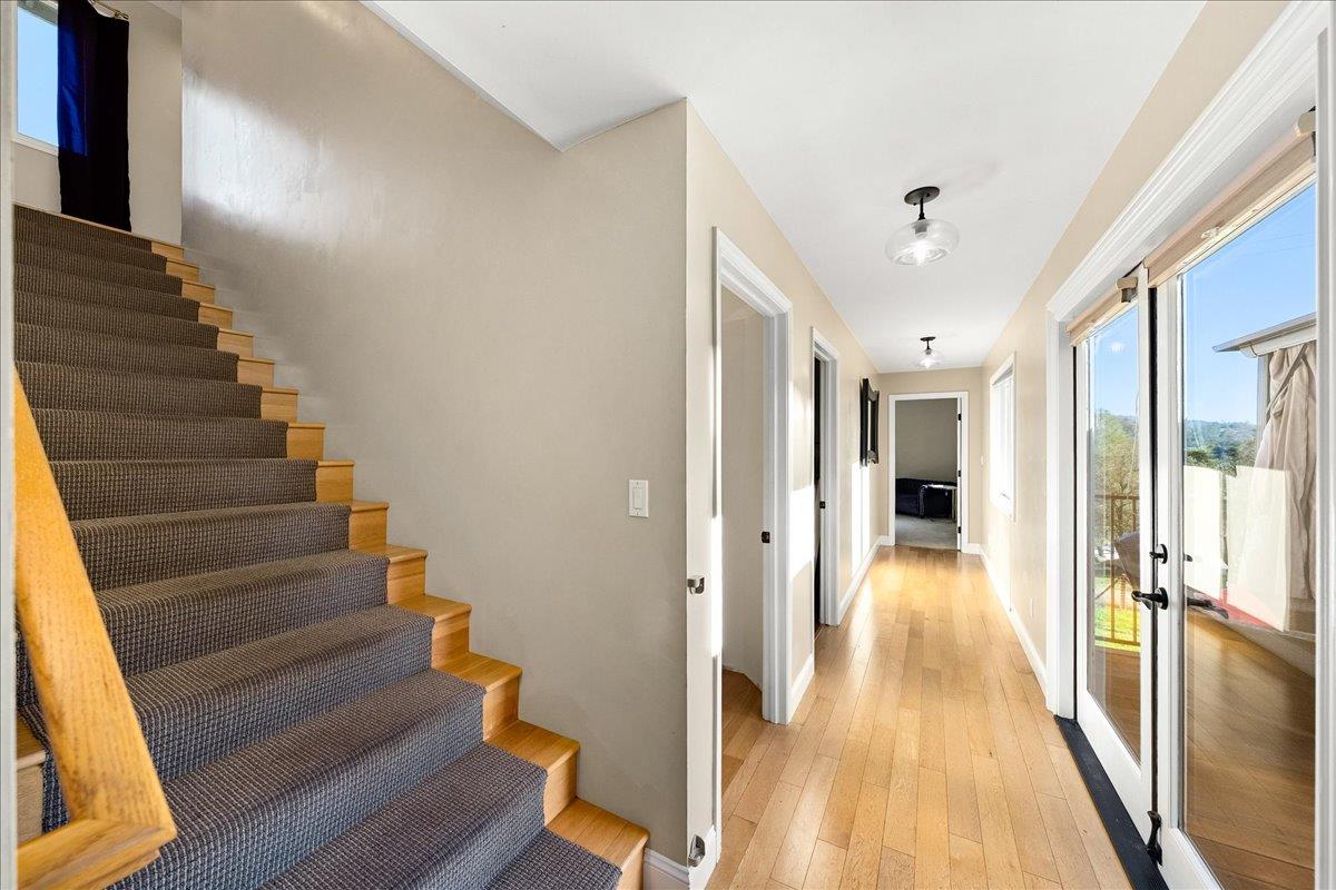 4371 Luneman Road Placerville, CA 95667 - Photo 37 of 77 a view of a hallway with wooden floor and staircase