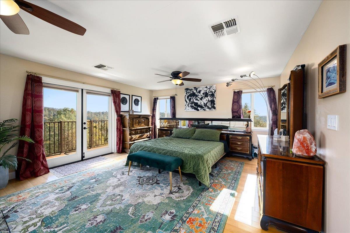 4371 Luneman Road Placerville, CA 95667 - Photo 40 of 77 a bedroom with furniture and a large window