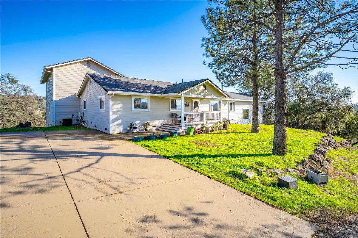 4371 Luneman Road Placerville, CA 95667 - Photo 5 of 77 a front view of a house with a yard
