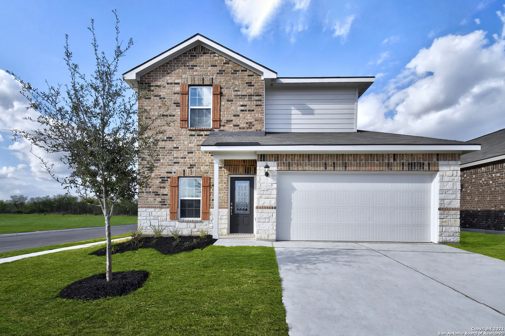 9226 Bennett Forest Converse, TX 78109 - Photo 1 of 1 a front view of a house with a yard