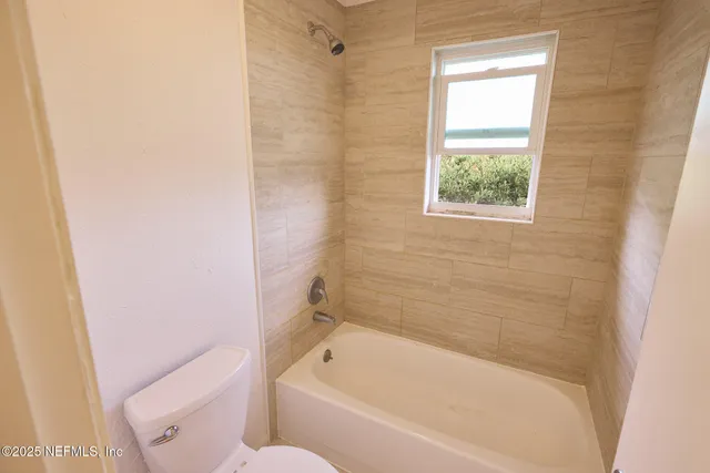 a view of a room with furniture