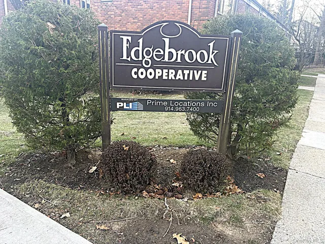 a sign broad on the side of the road