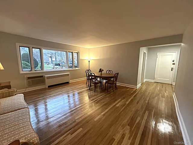 a view of a living room and dining room