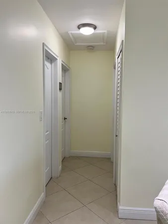 a bathroom with a shower and a toilet